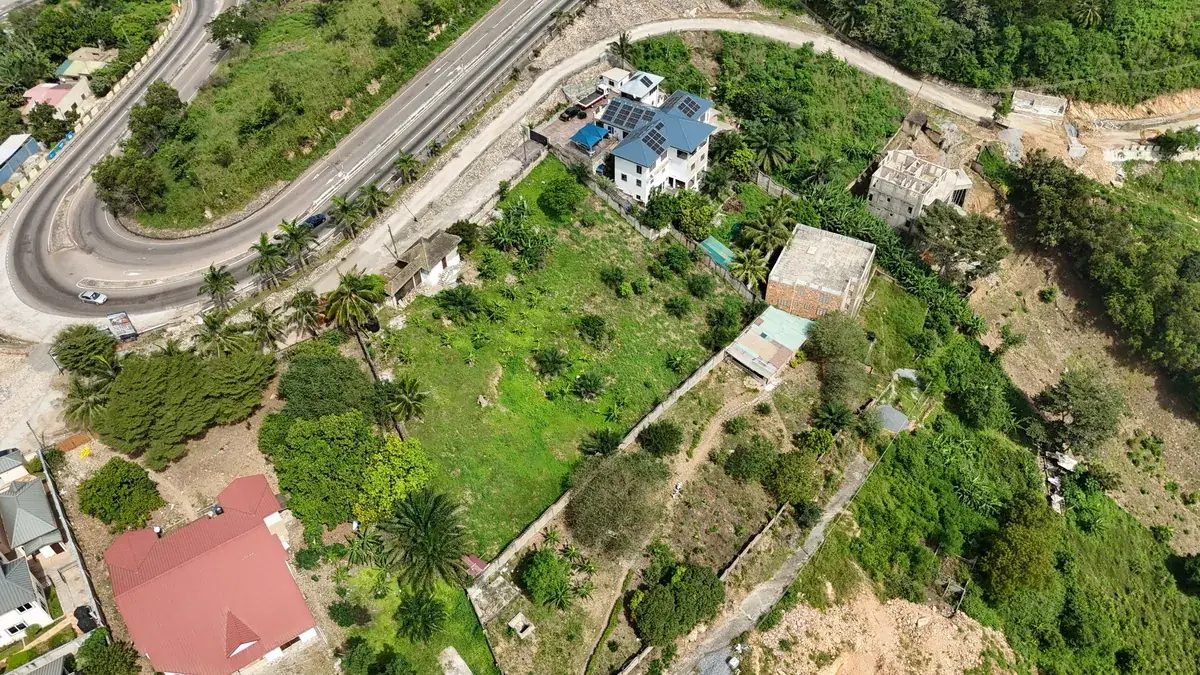 Hillside plots overlooking a city